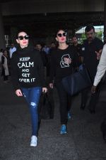 Karisma Kapoor, Kareena Kapoor snapped at airport on 19th March 2016